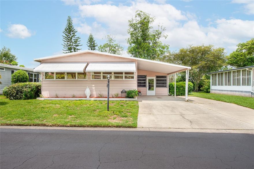 Spacious 2BR/2BA manufactured home in the desired community of Teka Village, 55+ community. This AS-IS property features a large Florida room with windows, large living room, separate dining room area with attached hutch, kitchen features range, refrigerator,  dishwasher. Family room with lots of natural light and windows. Master bedroom with plenty of closet space, master bathroom shower and 2nd bedroom with multiple closet space. Outside in the Florida room area is space for the laundry room and also a work/storage area. 13 month HWA Home warranty provided for buyer by seller. This 55+ gated community features a club house that offers many events and celebrations, large lap room, area for bbq, kitchen and sit in area. A great feature is the location of this community is within minutes to the turnpike, shoppings, restaurants, hospitals, 40 min drive to the beach, 30 min drive to Lake Nona and 30 min to Orlando International Airport. This property can be a perfect primary home or for snowbirds as a secondary home to enjoy during those winter months.