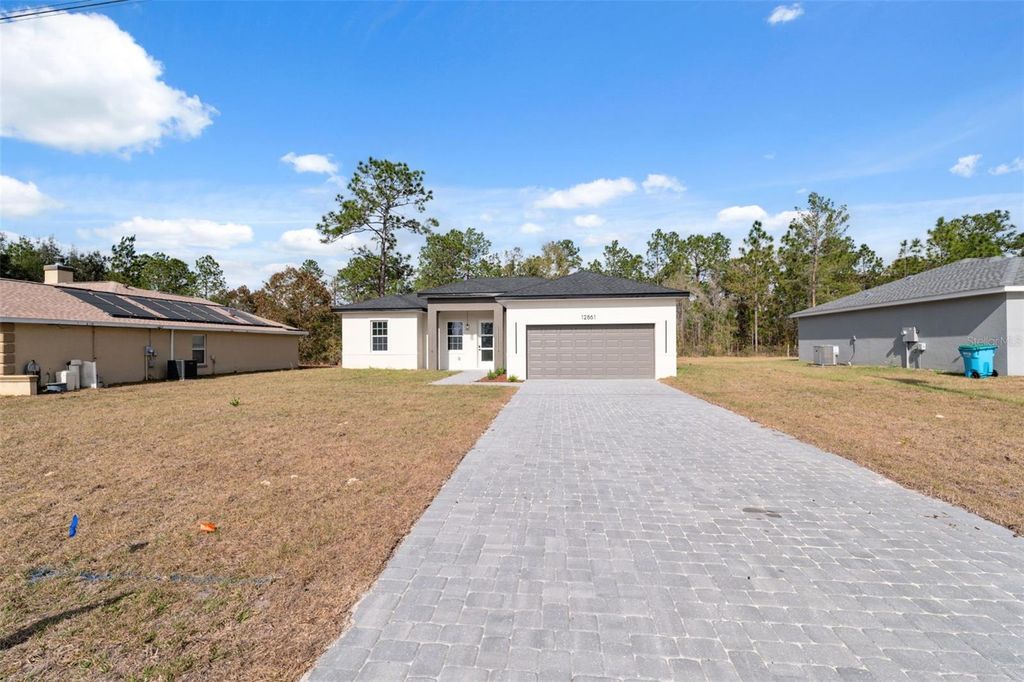 Photo of 12861 SW 77th Circle, Ocala, FL 34473 (MLS # O6368155)