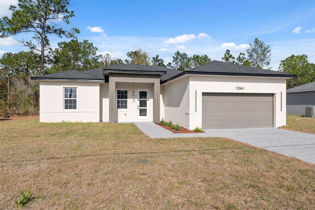 Photo of 12861 SW 77th Circle, Ocala, FL 34473 (MLS # O6368155)