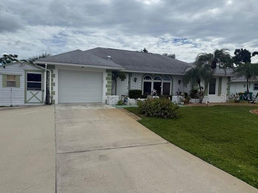 Photo of 3090 Lockwood Street, Port Charlotte, FL 33952 (MLS # C7515334)