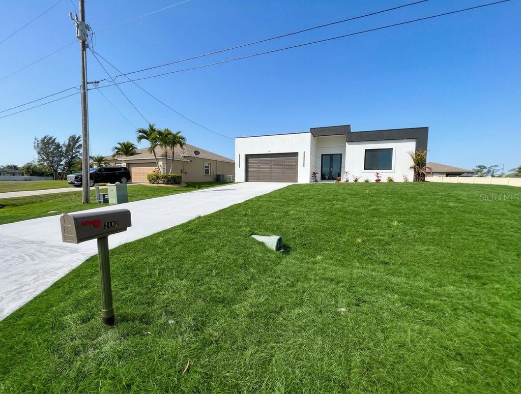 Photo of 2102 NW 25th Place, Cape Coral, FL 33993 (MLS # O6389786)