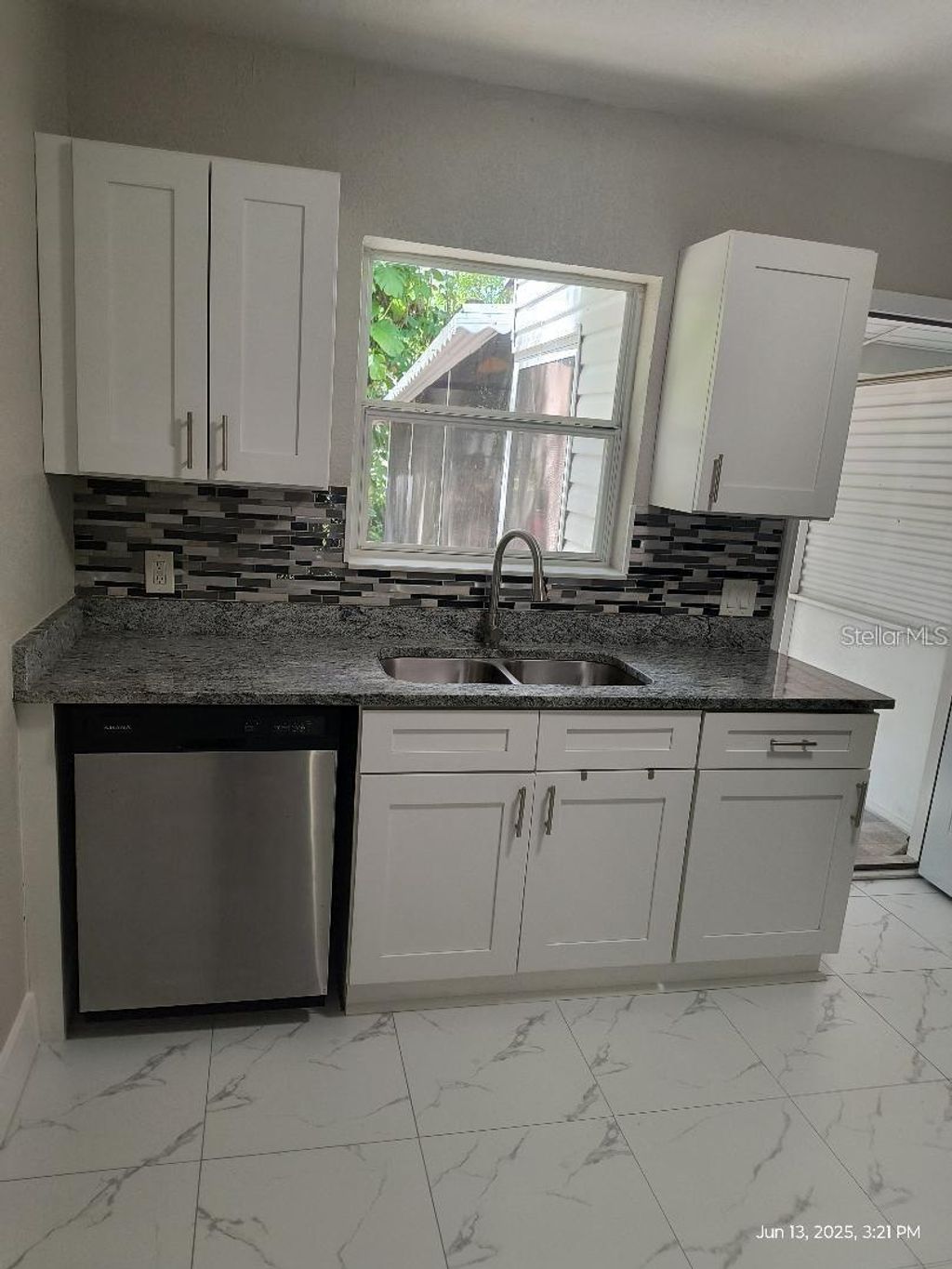 Photo of 921 W Hiawatha Street, Tampa, FL 33604 (MLS # TB8436542)