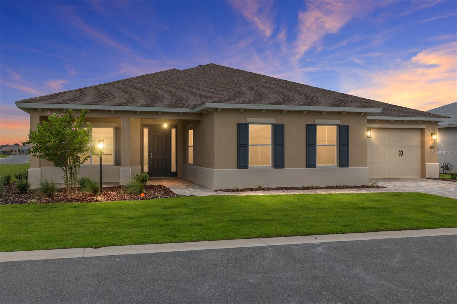 Welcome to the Montgomery model, situated on a desirable corner lot in the Balfour community at On Top of the World. This thoughtfully designed home offers 2 bedrooms, 2.5 bathrooms, a flex room, and a 3-car garage, blending style, comfort, and functionality. The exterior features a paver driveway and walkway, adding both charm and curb appeal. Inside, you’ll find tile flooring throughout and a flex room with French doors, ideal for a home office or den. The open living area features a 4-panel sliding glass door leading to the screened lanai, along with four floor-to-ceiling windows in the dining and kitchen area that flood the space with natural light. The gourmet kitchen is sure to impress with premium white staggered cabinets with crown molding, backsplash, under-cabinet lighting, built-in oven and microwave, 5-burner cooktop with range hood, walk-in pantry, and an oversized island. The private owner’s suite offers a 3-panel window overlooking the backyard, a walk-in closet, and a spa-like en suite with a double vanity sink with quartz counters, a zero-entry tiled shower with a built-in bench, and a linen closet. The guest bedroom includes a spacious closet and its own en suite with a quartz vanity and a tiled tub/shower combination, making it perfect for visitors. With modern finishes, upgraded features, and an open layout designed for today’s lifestyle, this Montgomery model is ready to welcome you home. In addition to this beautifully designed home, residents of On Top of the World enjoy access to world-class amenities including championship golf courses, state-of-the-art fitness centers, swimming pools, pickleball and tennis courts, walking trails, and a wide variety of clubs and social activities—offering an unmatched active-adult lifestyle.