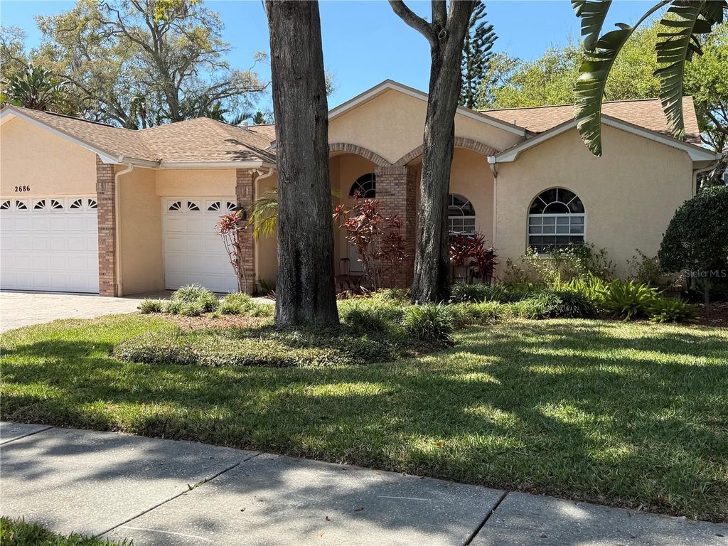 Photo of 2686 Crystal Circle, Dunedin, FL 34698 (MLS # TB8482149)