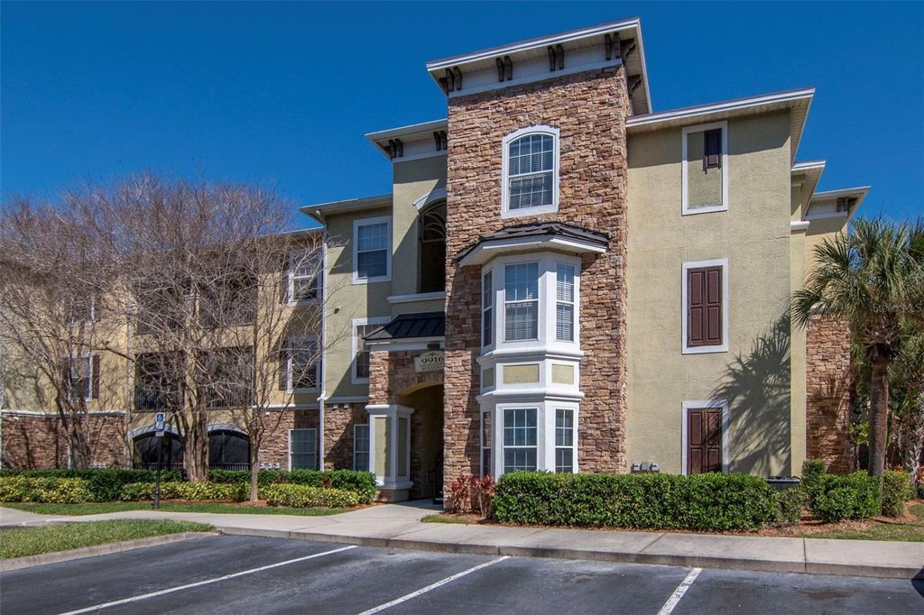 Photo of 9916 Courtney Palms Boulevard #103, Tampa, FL 33619 (MLS # TB8480816)