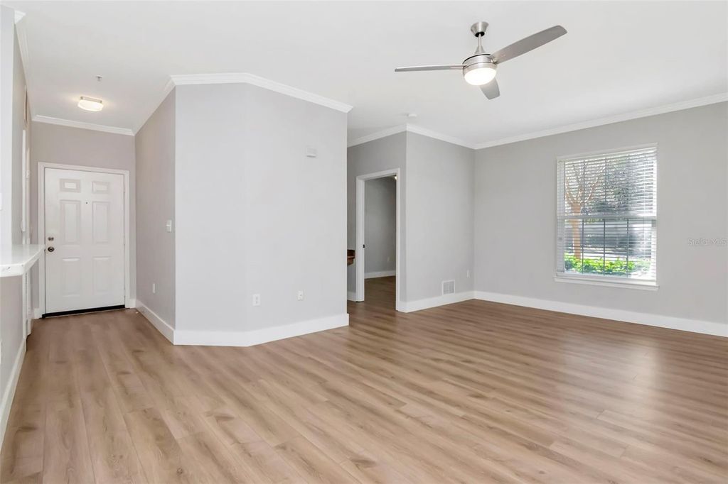 Photo of 9916 Courtney Palms Boulevard #103, Tampa, FL 33619 (MLS # TB8480816)