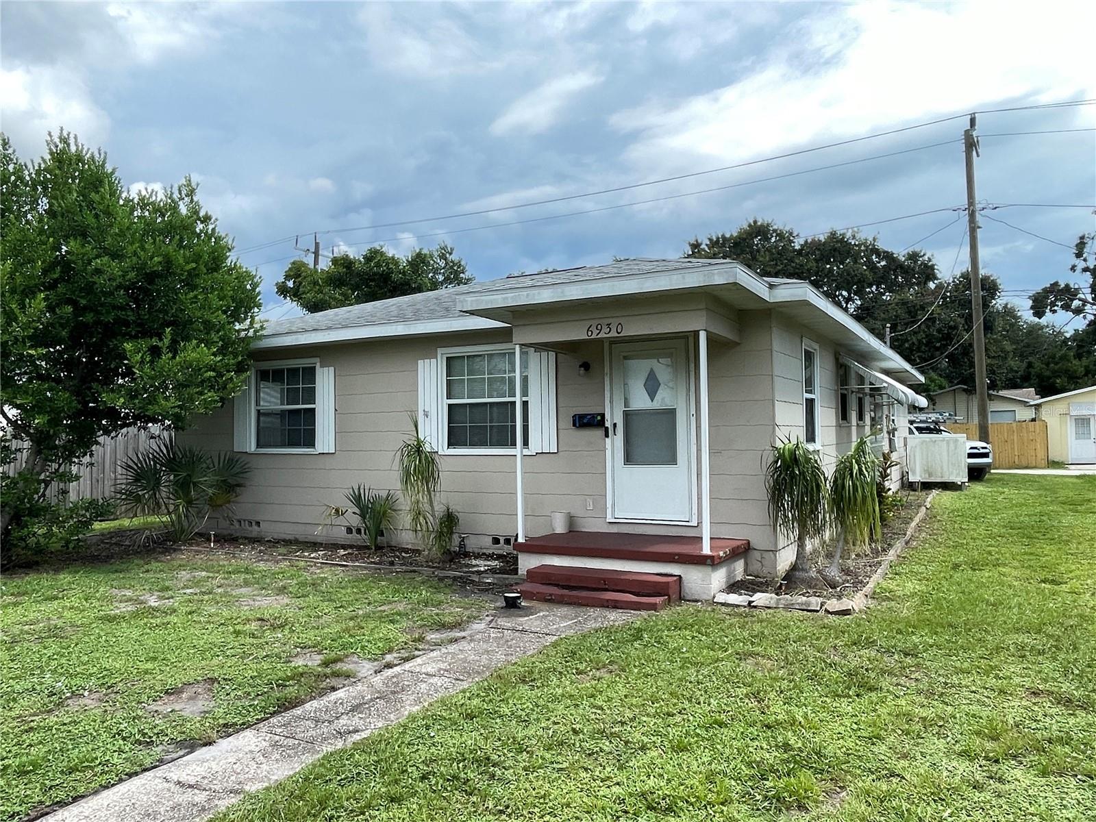 Located on a less traffic section of 5th Ave N. There is ally access to the garage that has an electronic opener and remote access. Hardwood floors are in good condition. Closet sizes are typical for the year it was built. Florida room off of the kitchen helps out with additional space for office etc. Fenced back yard with privacy wood fencing. Across from the St. Pete College main campus. Ideal for students. A credit score of at least 625 is required. A cosigner may be acceptable if reasons show the need. Background fee of $75/adult. Steady job history is desirable. Income should be at least 2 times the rent.