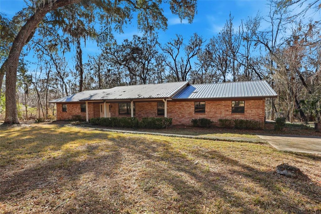 Photo of 820 NW 109th Drive, Gainesville, FL 32606 (MLS # GC537381)