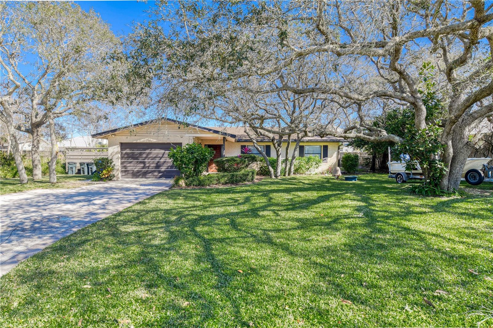 Welcome to this beautifully updated beach home in the highly sought-after Mickler's Subdivision, just a short 6-minute walk to the beach and boat ramp access! Perfect for beach and nature lovers, this property offers a perfect blend of comfort, style, and relaxation. Step inside to discover a completely remodeled kitchen featuring sleek stainless steel appliances, ample counter space, and modern finishes that make cooking a pleasure. The spacious floor plan includes 4 generously sized bedrooms, ideal for family or guests, 2 beautifully remodeled bathrooms, and a flex room that can serve as a home office, playroom, or additional living space. Set on a large lot, this property doubles as a private backyard oasis with a sleek heated pool and spa, a cozy firepit, and a covered gazebo perfect for entertaining. Beyond its charm as a primary residence or vacation getaway, this home is also a very successful vacation rental—offering not only lifestyle but investment potential!