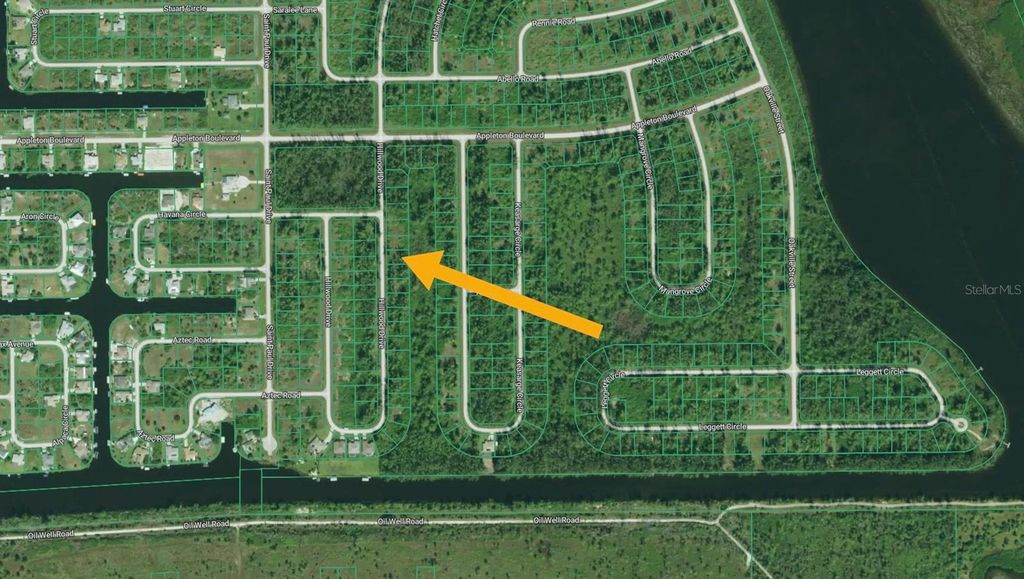 Photo of 10550 Hillwood Drive, Port Charlotte, FL 33981 (MLS # O6391991)