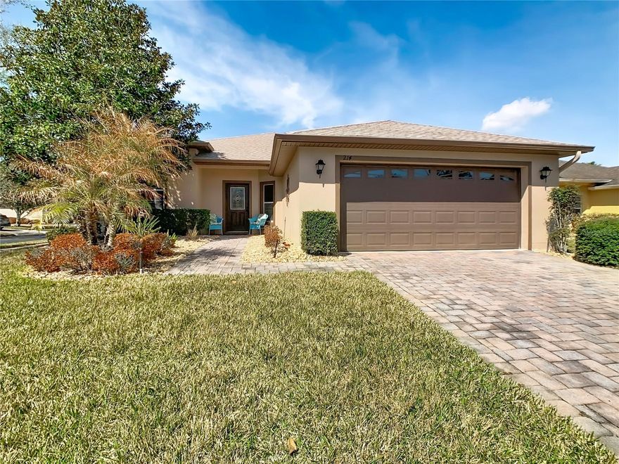 Melody model set on a water view lot in the heart of Solivita has been meticulously maintained with a 1/2026 Roof, 7/2020 HVAC, a 2017 Enclosed Florida Room with sliding doors to an over 200 Sq. Ft. screened lanai. A half glass & leaded front door enhanced by mature landscaping gives the home great curb appeal from the moment you arrive. Step inside to a tiled foyer that opens to the Great Room, Formal Dining Room, Country Kitchen with stainless steel appliances, serving bar, and a closet pantry enhanced by a separate eat-in area which overlooks the front yard. The primary suite is private & spacious with sliders to the Florida Room. The en-suite bath includes double sinks, walk-in closets, a shower, and private water closet. On the opposite side of the home, you'll find a generously sized secondary bedroom with its own en-suite bathroom and dual closets. Toward the back of the house is a third bedroom perfect for guests or hobbies. An indoor laundry room has plumbing pipes & drains already installed for a future utility sink & ample storage. A full 2 car garage with attic access make this a must-see home. This home is just a short stroll or golf cart ride to one of the 14 community pools or downtown Solivita & The Palms Recreation Center.  Solivita is an active adult 55+ community located in Poinciana, Florida. It is approximately 50 minutes from Disney World & the Orlando International Airport. Solivita has a total of 5,470 homes. Solivita amenities include: - a manicured softball diamond & field - 36 holes of championship golf that can be played by joining the Stonegate Golf Club or pay by round - 2 STATE of the Art Amenity centers with updated exercise equipment, yoga studio & meeting rooms - 3 restaurants, 14 heated pools, 17 pickleball courts, tennis courts, bocce, & miles of bike paths - 2 dog parks(Small & Large Dogs) - Corn Hole - Tot Lot playground - community garden - over 250 resident clubs. The HOA maintains landscape, irrigation, roads, manned guard gates & automated gate access for residents via license plate readers & provides residents with Fiber Optic Internet & TV service. Poinciana Lakes Plaza opened in 2024. It features multiple stores & restaurants that make shopping & eating out easy with access from Solivita. Furniture is available under separate contract. Come & make this home your retreat in Florida.
