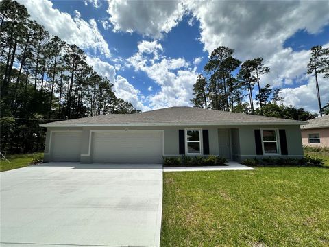 Photo of 48 Rippling Brook Drive, Palm Coast, FL 32164 (MLS # C7524125)