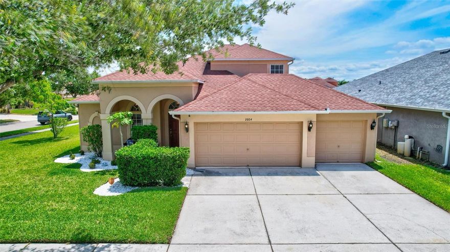 Limited Time Only: 3.490% Interest Rate Avail on Conventional Loan. USDA 100% financing for qualified buyers also available on This Stunning River Bend Home! Apply Today Before This Rate Disappears! As you drive into River Bend, you'll immediately notice what sets this community apart, mature landscaping and beautiful tree-lined streets that create a warm, established neighborhood feel from the moment you arrive.

Don't miss this rare opportunity a beautifully renovated 5-bedroom, 3-bath home with a 3-car garage on a desirable corner lot in the sought-after River Bend subdivision, ready to move in!

From the moment you step inside, you'll appreciate the thoughtful flow this home offers — ideal for both everyday living and entertaining. The heart of the home is a stunning kitchen featuring brand-new cabinetry, all new appliances, and gleaming quartz countertops, with a breakfast bar that opens seamlessly to a warm and inviting family room. Step through to your covered lanai and enjoy Florida living at its finest.

The spacious primary suite is a true retreat, complete with a luxurious ensuite bath boasting new double vanities, a separate shower, and a large jetted soaking tub. Three additional bedrooms are conveniently located on the main floor, while upstairs you'll discover a fifth bedroom, a full bath, and a fabulous flex/bonus room — perfect as a media room, home office, or game room.

Peace of mind comes standard here:
• New roof (2020) — and hip roof to enjoy lower insurance rates
• New A/C system (2022)
• Hurricane shutters included
• Home security system with cameras
• Located in an X Flood Zone — most mortgage companies do not require flood insurance
• Smart home system with extended WiFi for zero dead zones
• Operational sprinkler system to keep your lawn picture-perfect

And the location? Unbeatable. You're just one block from the large 124,000-gallon community pool, 2 playgrounds, tennis courts, pickle ball, fitness center, dog park, basketball court, soccer field, splash pad and a serene lake with a dock. There is also a community dock on the Little Manatee River and many green space areas with walking and bike trails. The CDD fee is conveniently included in the property taxes and includes all of these luxury amenities-giving you a resort-style lifestyle.

Ruskin - ringed by Tampa Bay and the Little Manatee River, Ruskin offers residents a waterfront community steeped in Florida's natural scenery — canals and the river weave throughout, creating scenic spots where you might spot dolphins or manatees, all under swaying palms and flowering bushes. 

Ruskin delivers a rare combination of small-town convenience and friendliness with a great location and everything Gulf Coast living has to offer — and with easy access to I-75 and US Highway 41, Tampa, Bradenton, and Sarasota are just a short drive away.
Love the outdoors? E.G. Simmons Regional Park offers fishing, camping, kayaking, and stunning sunsets, while Little Manatee River State Park is perfect for hiking, horseback riding, and canoeing along its scenic banks. Cap off your weekend with fresh seafood and cold drinks at the Sunset Grill and Beach Bar at Little Harbor — a beloved local waterfront spot nearby, where the views are as good as the food. And for a truly one-of-a-kind evening, catch a movie at the Ruskin Family Drive-In Theatre, a beloved local landmark that has been shining its lights since 1952. This is more than a home — it's a lifestyle.