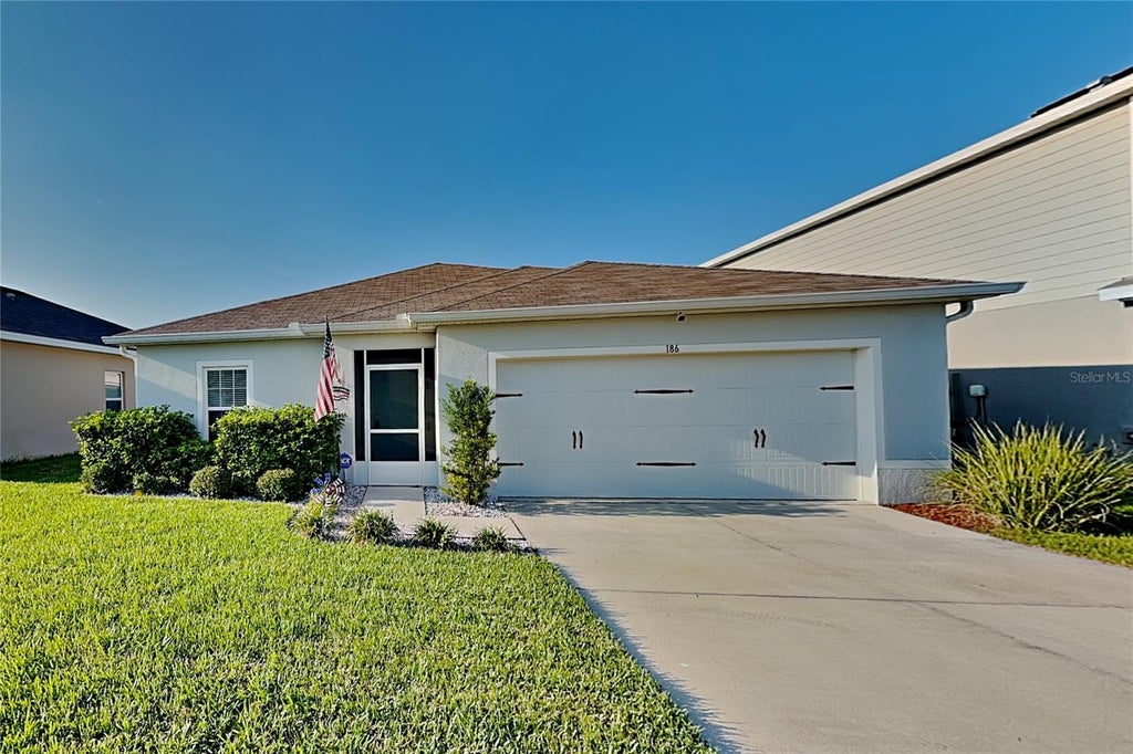 Photo of 186 Piave Street, Haines City, FL 33844 (MLS # O6434903)
