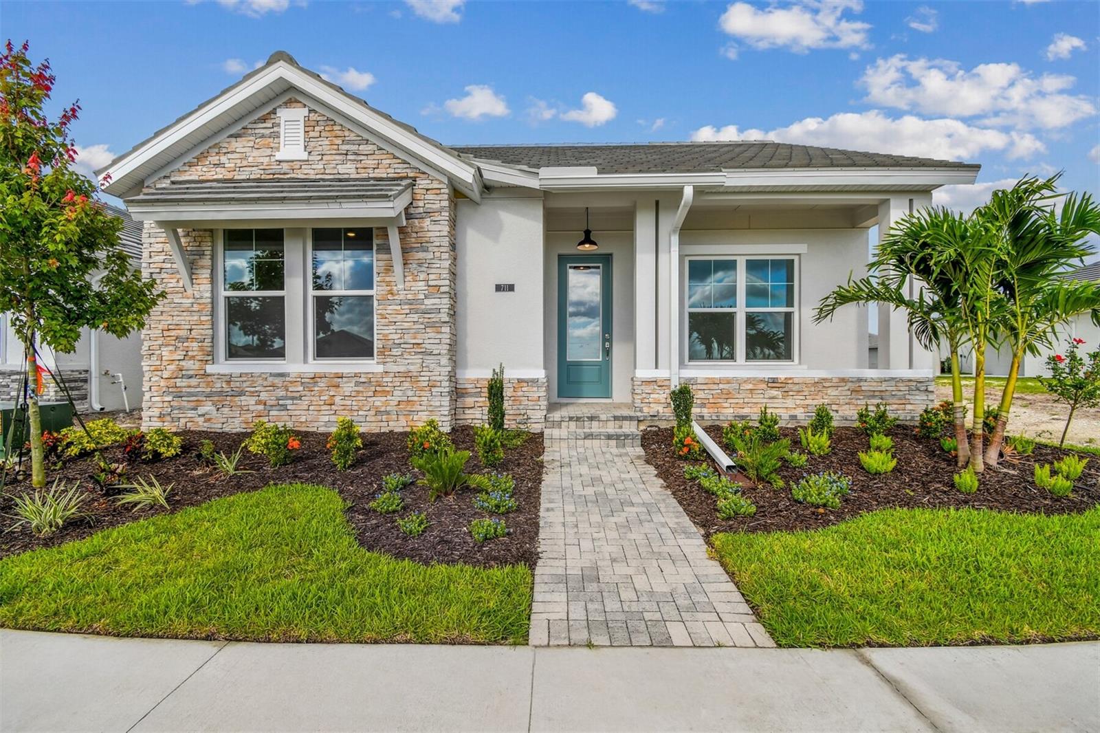 The Mapleton by David Weekley Homes offers 3 bedrooms, 2 baths, study, and 2,019 square feet of thoughtfully designed living space. The open-concept layout feels spacious and inviting, with an oversized kitchen featuring abundant counter space for cooking and entertaining. Natural light fills the home through oversized hurricane-impact windows, offering both energy efficiency and peace of mind. Enjoy easy indoor-outdoor living with a covered lanai that’s perfect for relaxing or hosting guests. Low-maintenance living is made simple with lawn care included, giving you more time to enjoy community amenities such as a resort-style pool, fitness center, game room, and events organized by a dedicated lifestyle director. Purchase a select David Weekley quick move-in home before September 30th, qualified buyers may be eligible for a starting rate as low as 3.99% (4.031% APR) when financed with a conventional 7/6 adjustable rate mortgage home loan through Acrisure Mortgage.