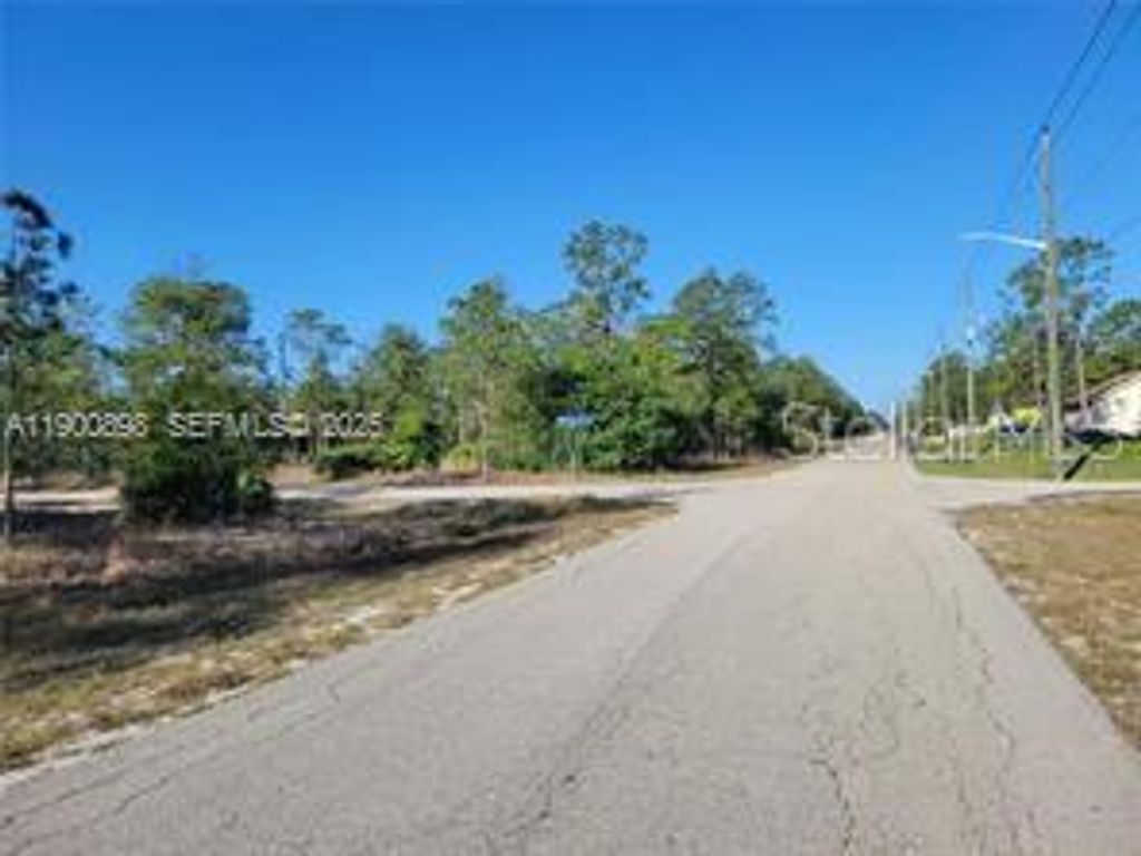 Photo of 1600 E 15th Street, Lehigh Acres, FL 33972 (MLS # O6374271)