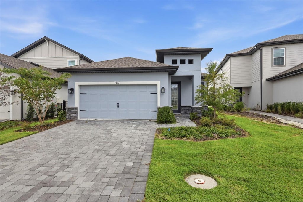 Photo of 7721 Somersworth Drive, Kissimmee, FL 34747 (MLS # O6437257)