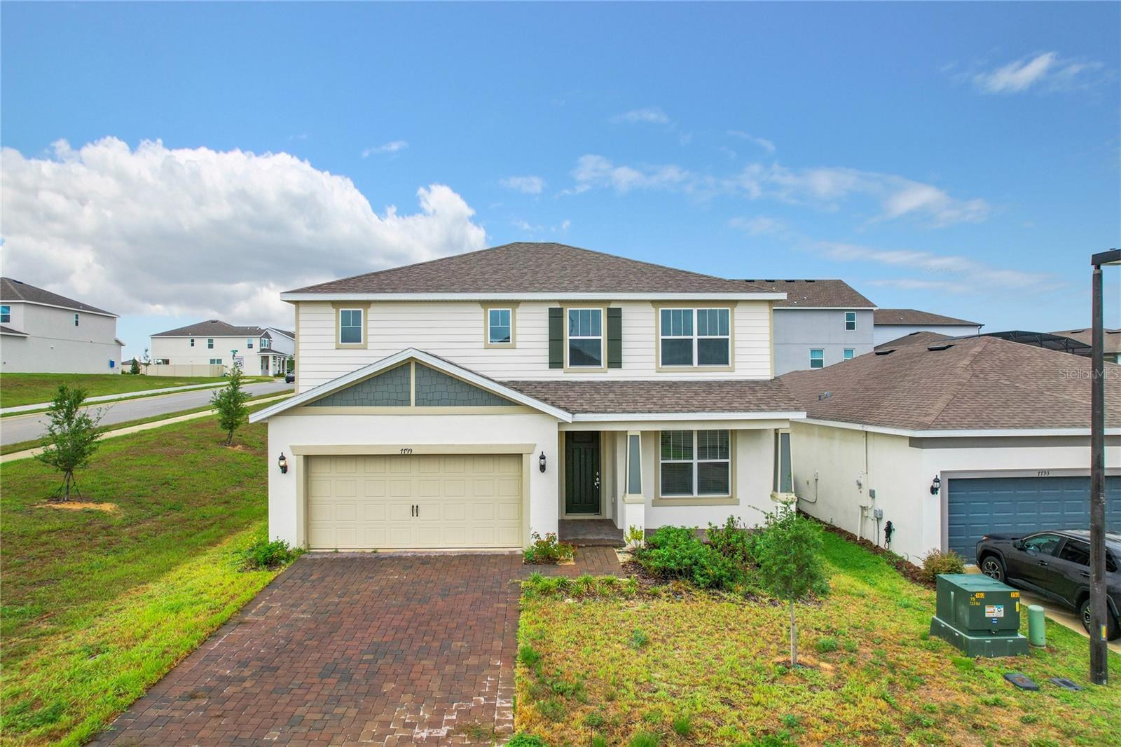 Welcome to your dream home in the heart of Clermont's most sought-after community! This brand new, barely lived-in 4-bedroom, 2.5-bathroom masterpiece. Nestled in a serene neighborhood with a stunning resort-style zero entry pool, this home offers a lifestyle of relaxation and sophistication. Step inside and be captivated by the impeccable design and thoughtful upgrades throughout. The gourmet kitchen is a chef's delight, featuring sleek countertops, custom cabinetry, and top-of-the-line appliances including a washer, dryer, and refrigerator. Entertaining is a breeze with the open concept layout that seamlessly integrates the kitchen, family room, and dining areas. Enjoy meals in the spacious eating space in the kitchen or host elegant dinners in the formal dining room. The living room boasts abundant natural light and a seamless flow into the dining room, creating a perfect ambiance for gatherings. Upstairs, the primary bedroom is a serene retreat with a luxurious en-suite bathroom featuring dual sinks, and a walk-in shower. Additional bedrooms gives ample space, ideal for guests or as versatile home offices. Every detail has been carefully considered, from the in-wall pest system to the energy-efficient thermostat and ceiling fans in every room, ensuring comfort and convenience year-round. With over 2386 square feet of living space, there's room for everyone to spread out and relax. Location is paramount, and this home delivers. Just a short 25-35 minute drive brings you to the magic of Disney, where you can even catch glimpses of fireworks from your own backyard on special nights. Explore Clermont's vibrant dining scene, shopping options, and outdoor activities, all within easy reach. Don't miss your chance to experience the pinnacle of Florida living in this immaculate home. Schedule your private tour today and discover why this property is the perfect place to call home. Welcome comfort, welcome to Clermont, welcome to your new home!!!