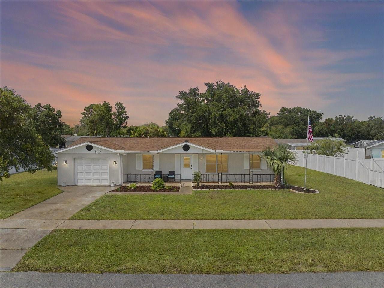 Welcome to this great 2 bedroom, 2 bathroom home in the heart of Spring Hill. The home offers a split floorplan with the primary bedroom and bathroom on the right side of the home. As you approach, you will notice the covered front porch area, perfect for rocking away the evening times. Entering the home, you notice the open living room and dining room, with an additional den area towards the back of the home. The primary bedroom is to your right with a walk in closet and private bath with a shower. The guest bedroom and guest bathroom are to the left, and there is a tub/shower in the guest bathroom. The galley style kitchen has new cabinets and countertops. Through the kitchen is the inside laundry room that leads to the oversized single car garage. There is a small storage area in the garage for tools or just extra storage. The den area offers a flex space for a play area or office space. There are sliding glass doors leading into a screen in back porch area with windows. The backyard has a small pavered area for having a small firepit or grilling area. The yard is fenced in most sides already. You are minutes to the Weeki Wachee Springs Park or all the shopping along US Highway 19 and Cortez Blvd.