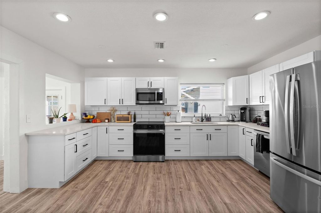 Photo of 775 39th Avenue NE, St Petersburg, FL 33703 (MLS # TB8472725)