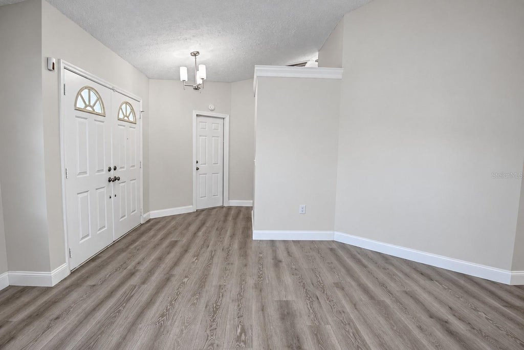 Photo of 8402 Royal Hart Drive, New Port Richey, FL 34653 (MLS # W7890627)