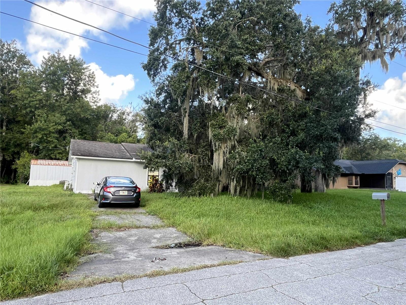 Short Sale. Needs love ! With a separate in-laws suite remodeled home.