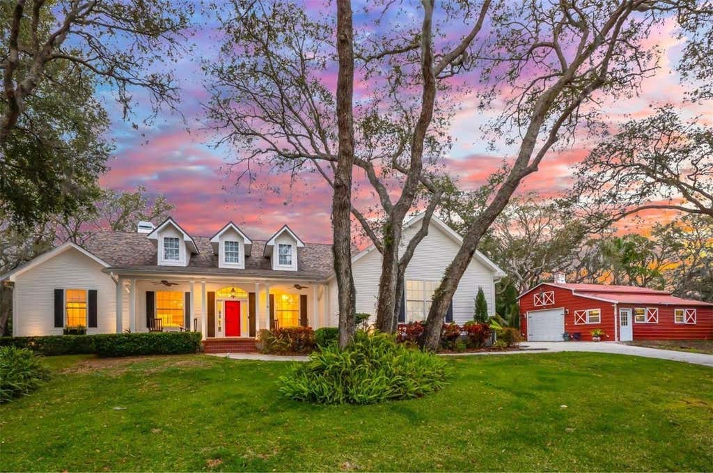 Photo of 653 Old East Lake Road, Tarpon Springs, FL 34688 (MLS # TB8469264)