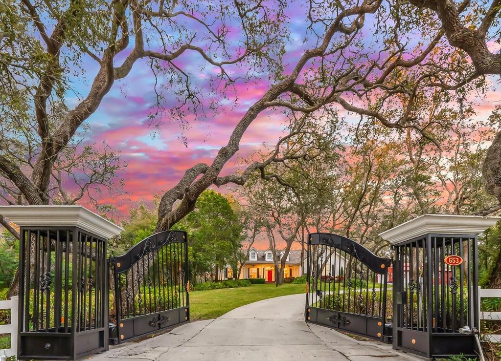 Photo of 653 Old East Lake Road, Tarpon Springs, FL 34688 (MLS # TB8469264)