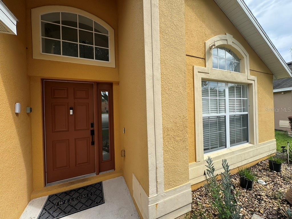 Photo of 1101 Orange Cosmos Boulevard, Davenport, FL 33837 (MLS # O6446802)