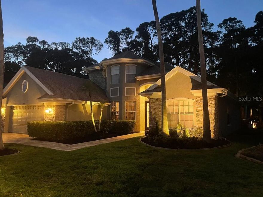 Discover luxury living in the Greens, a 24-hour GATED neighborhood in the Heart of Westchase! This stunning 4-bedroom plus office, 3-bathroom home features tons of upgrades, a gourmet kitchen with gas range, beautiful gray cabinets, oversized island, gleaming granite countertops, stainless steel appliances, and a spacious pantry, following effortlessly into the family room, ideal for entertainment. The grand entryway opens into a formal living and dining room + office (can be used as a 5th bedroom if needed) The family room showcases high ceilings, impressive wall niches with built in shelves, wood staircases connecting to the fourth bedroom upstairs and a triple slider that opens to the pool. A spacious master suite offers gorgeous views of the conservation area. The stunning master bathroom has been completely remodeled with porcelain tile, a custom seamless glass shower with an elegant and modern soaked tub and a beautiful double custom vanity. The second and third bedrooms are in a separate wing of the home with an adjacent remodeled bathroom. Escape to your outdoor oasis with a NEWER pool, recently installed pool tiles and pool surface, new pool pump, Roof installed in 2020, water softener, home intercom system and Built-in in-home sound system. Conveniently located within less than 30 minutes from the beaches, 15 minutes from Tampa international airport, and a convenient commute to downtown Tampa.