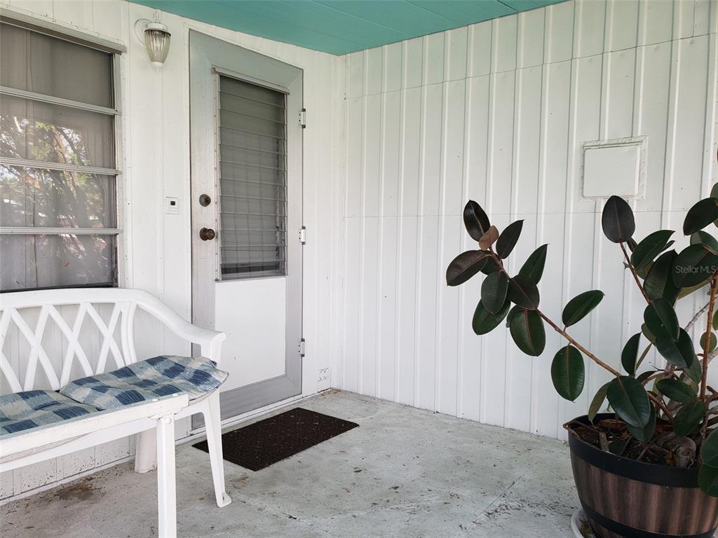 Relaxation and Comfort in a 55+ Community. Welcome to your fully furnished mobile home in a peaceful 55+ community. Thoughtfully designed with a spacious great room layout, this home feels more open than the square footage suggests—perfect for comfortable living and entertaining. Enjoy your morning coffee on the inviting front patio or unwind in the screened-in back patio, where you’ll also find your private washer and dryer. The master bedroom features a luxurious king-size bed and an en suite half bath, while the guest bedroom offers a comfortable queen bed and easy access to the full bath with a tub/shower combination. An attached carport offers convenient covered parking and easy entry into the home, rain or shine. Community amenities include a sparkling swimming pool, shuffleboard courts, and an active clubhouse for social events and activities. Ideally located just off State Road 70 with quick access to US 41, Hwy. 301, and I-75, you’re just minutes from shopping, dining, and everyday essentials. Our beautiful beaches are a short drive away. Available for a minimum 90-day stay, this home offers easy living, modern comfort, and a welcoming community atmosphere.
