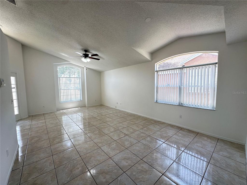Photo of 311 Downing Circle, Davenport, FL 33897 (MLS # O6411315)