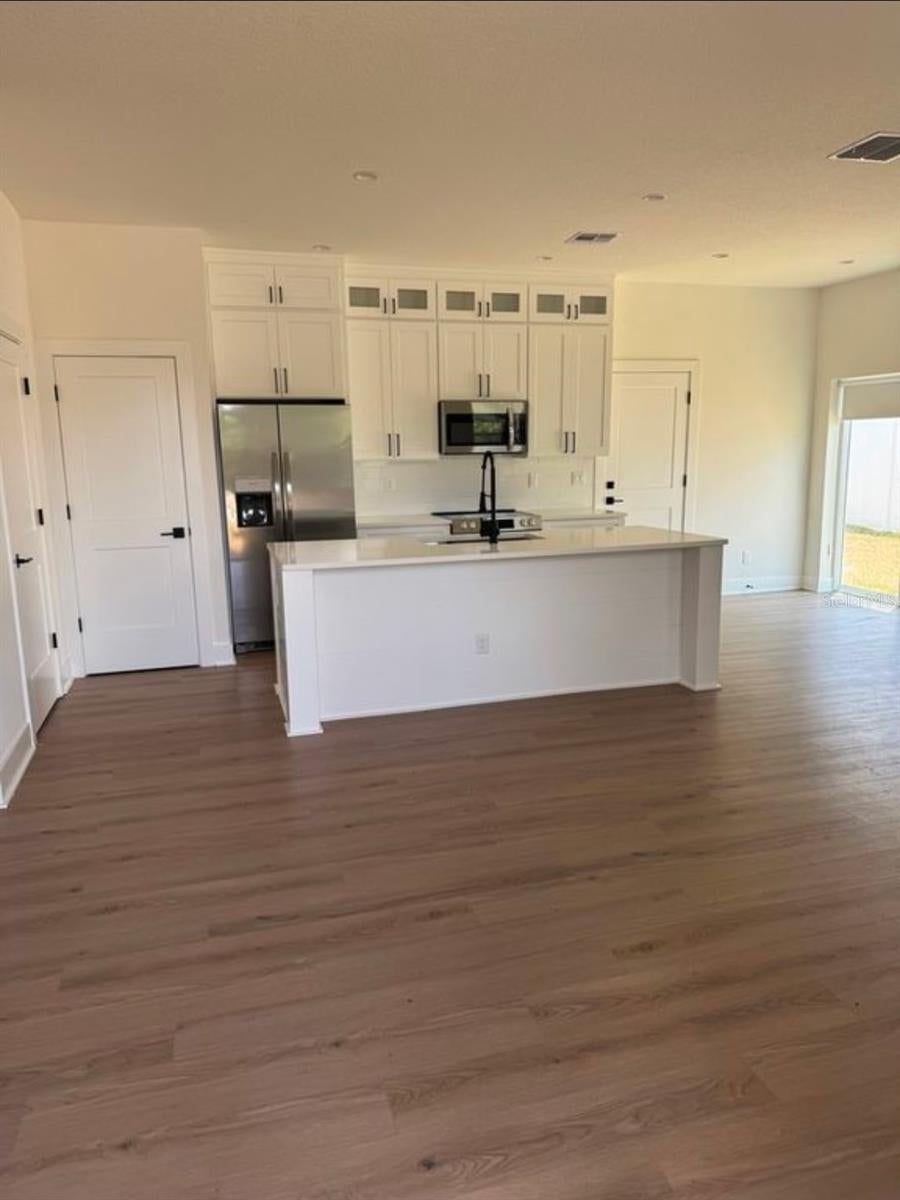 Photo of 1999 Peel Ave, Orlando, FL 32806 (MLS # O6429895)