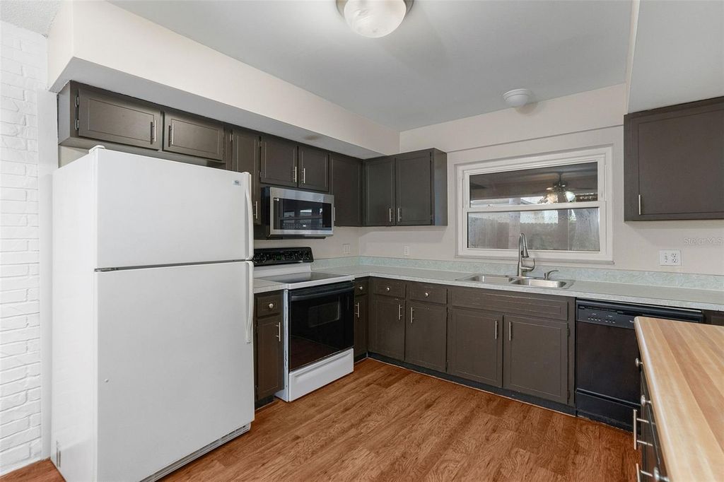 Photo of 2078 Loma Linda Way N, Clearwater, FL 33763 (MLS # TB8456076)