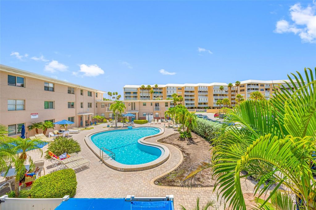 Photo of 6700 Sunset Way #105, St Pete Beach, FL 33706 (MLS # TB8411461)