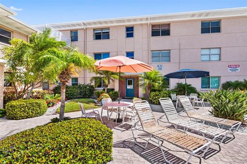 Photo of 6700 Sunset Way #105, St Pete Beach, FL 33706 (MLS # TB8411461)