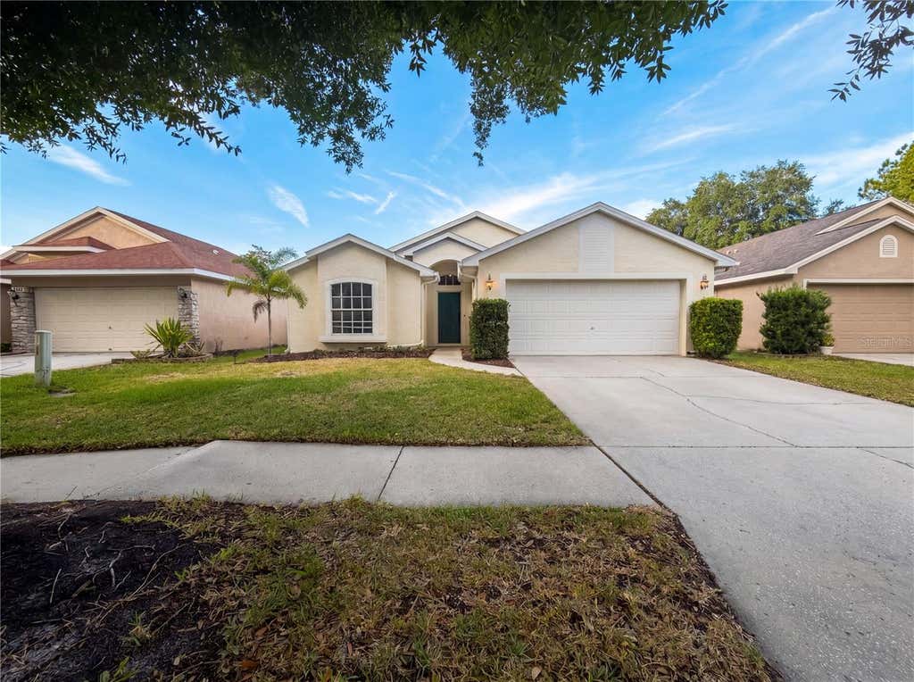 Photo of 4532 Perdita Lane, Lutz, FL 33558 (MLS # O6418358)