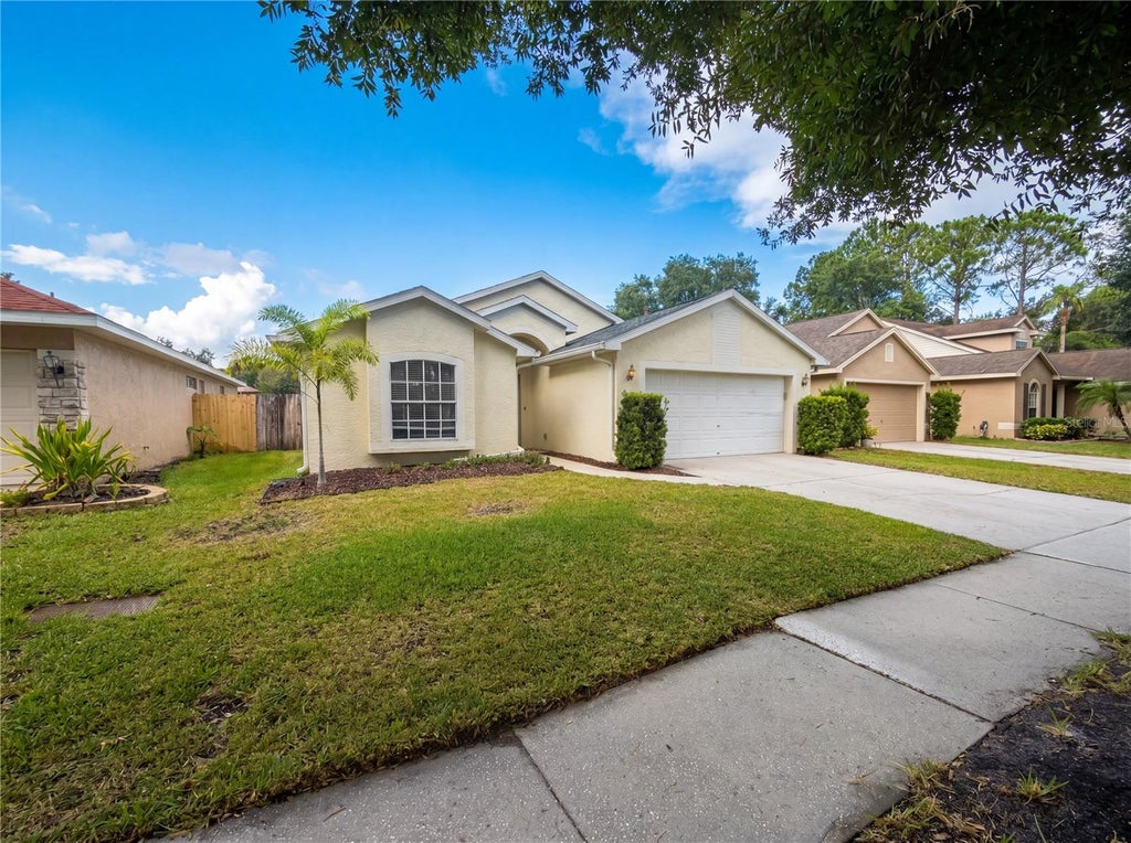 Photo of 4532 Perdita Lane, Lutz, FL 33558 (MLS # O6418358)