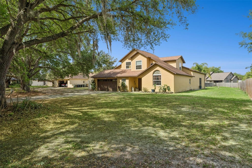 Photo of 1714 Cheryl Lane, Kissimmee, FL 34744 (MLS # O6395426)