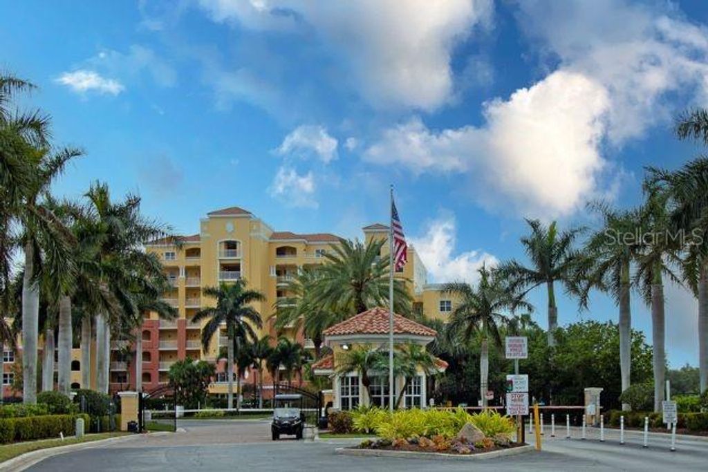 Photo of 615 Riviera Dunes Way #402, Palmetto, FL 34221 (MLS # A4690297)