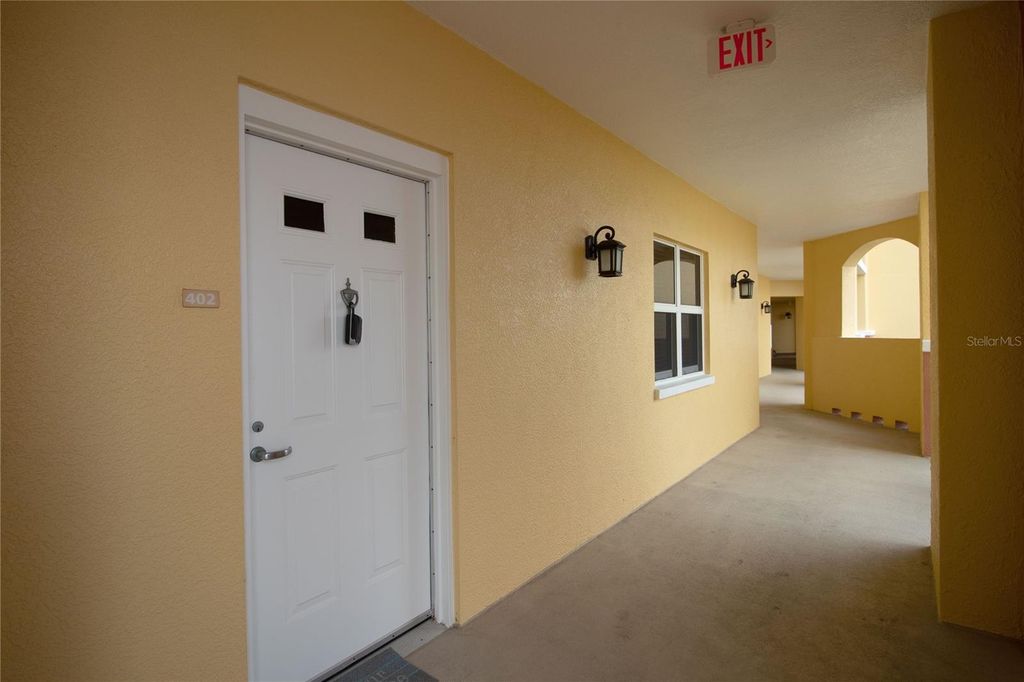 Photo of 615 Riviera Dunes Way #402, Palmetto, FL 34221 (MLS # A4690297)