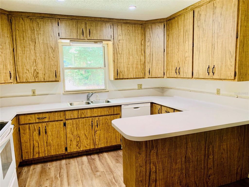 Photo of 5200 N Apopka Vineland Road, Orlando, FL 32818 (MLS # O6409437)