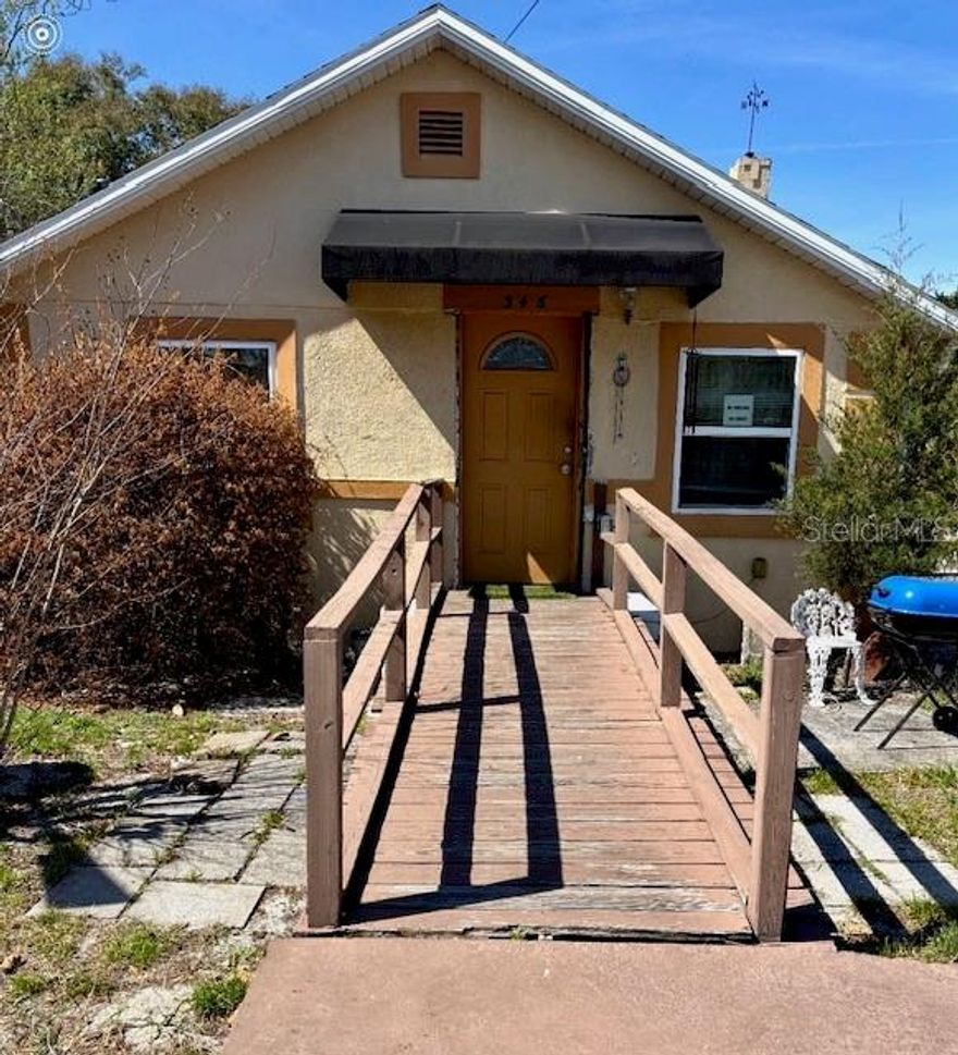 This home has a lot of potential!  It is a fixer upper nestled on a large site.  There is a warehouse located on the back portion of the lot behind the main house.