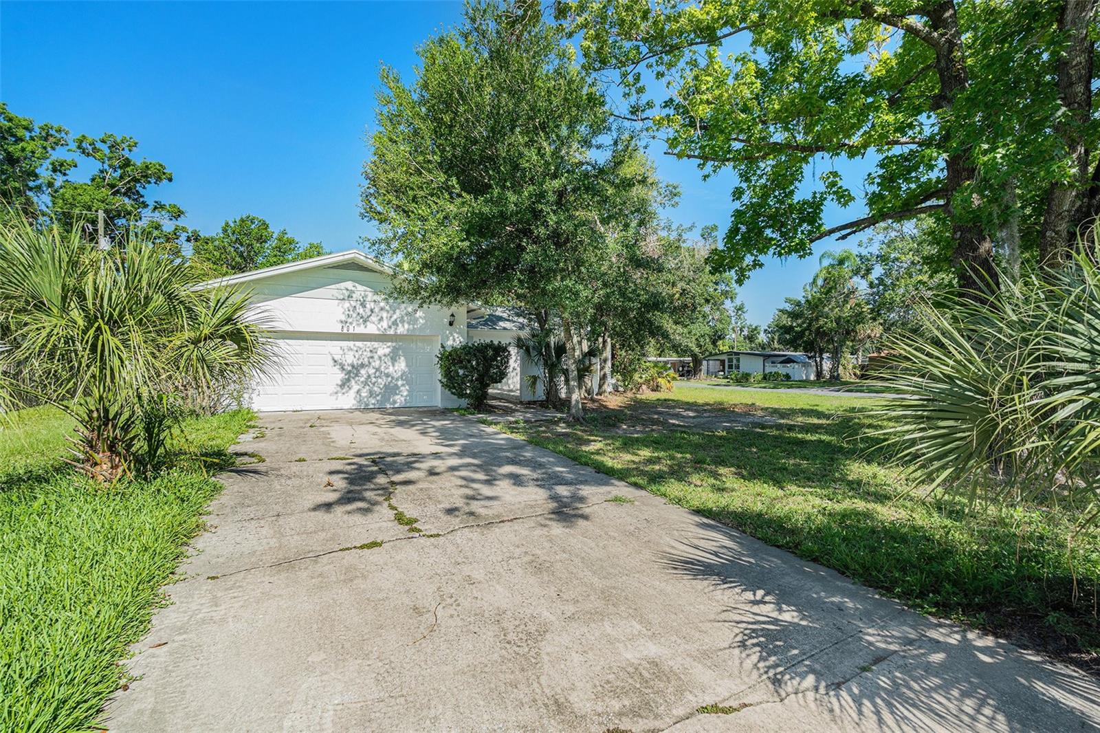 One or more photo(s) has been virtually staged. Newly renovated in 2025 including new ROOF! Welcome to 801 Lamont Pl, a beautifully updated and spacious home located in the heart of Temple Terrace, FL. Situated on a quiet street in a charming and established neighborhood, this 4-bedroom, 2-bathroom residence offers 1,910 square feet of comfortable living space and is ready for you to move in and start making memories. Whether you're a growing family, a couple in search of extra room, or an investor looking for a solid property with lasting value, this home presents an ideal opportunity. Step inside and you’ll immediately notice the open and airy layout that sets the tone for the entire home. Designed with functionality and comfort in mind, the generous living areas offer plenty of space for both formal and informal gatherings. Whether you're hosting guests, enjoying a cozy movie night, or simply relaxing after a long day, the expansive family room and adjacent living and dining spaces provide the versatility you need. Large windows allow natural light to flood the home, enhancing the fresh, neutral interior made even more inviting with new flooring and freshly painted walls throughout. The heart of this home is the beautifully updated kitchen, thoughtfully designed to meet the needs of modern living. Featuring sleek stone countertops, an abundance of cabinetry for storage, and all-new stainless steel appliances, this kitchen is as stylish as it is functional. Whether you're preparing quick weekday meals or cooking for a crowd, you'll appreciate the efficient layout and contemporary finishes. A breakfast bar offers additional seating and connects seamlessly to the adjacent dining area, making this space perfect for entertaining or casual family meals. All four bedrooms are generously sized, providing ample space for rest, relaxation, or even home office setups. Each bedroom features large closets and new flooring, offering a fresh and clean slate for your personal touch. The primary suite is particularly impressive, offering a private retreat with enough room for a king-sized bed, sitting area, and more. The attached bathroom has been updated for comfort and convenience, featuring modern fixtures, new finishes, and a clean, contemporary look. The secondary bathroom mirrors this style and serves the additional bedrooms with ease, providing a comfortable space for family members or guests alike. Outside, the property offers additional space to enjoy Florida’s beautiful weather. The backyard is large and versatile, with room for gardening, play, or future enhancements such as a patio or outdoor kitchen. Whether you're grilling out on the weekends, enjoying your morning coffee, or letting pets and kids roam, the outdoor space offers potential for relaxation and recreation. The home also includes a covered entryway and driveway parking for added convenience. Located in the desirable Temple Terrace community, 801 Lamont Pl offers easy access to local parks, schools, shopping centers, restaurants, and major highways for a smooth commute to downtown Tampa, the University of South Florida, and beyond. With its spacious layout, numerous updates, and move-in ready condition, this home is a standout in today’s market. It’s the perfect blend of space, style, and location—an excellent option whether you're searching for your forever home or a smart investment. Schedule your private showing today and see firsthand what makes 801 Lamont Pl a must-see home in Temple Terrace.