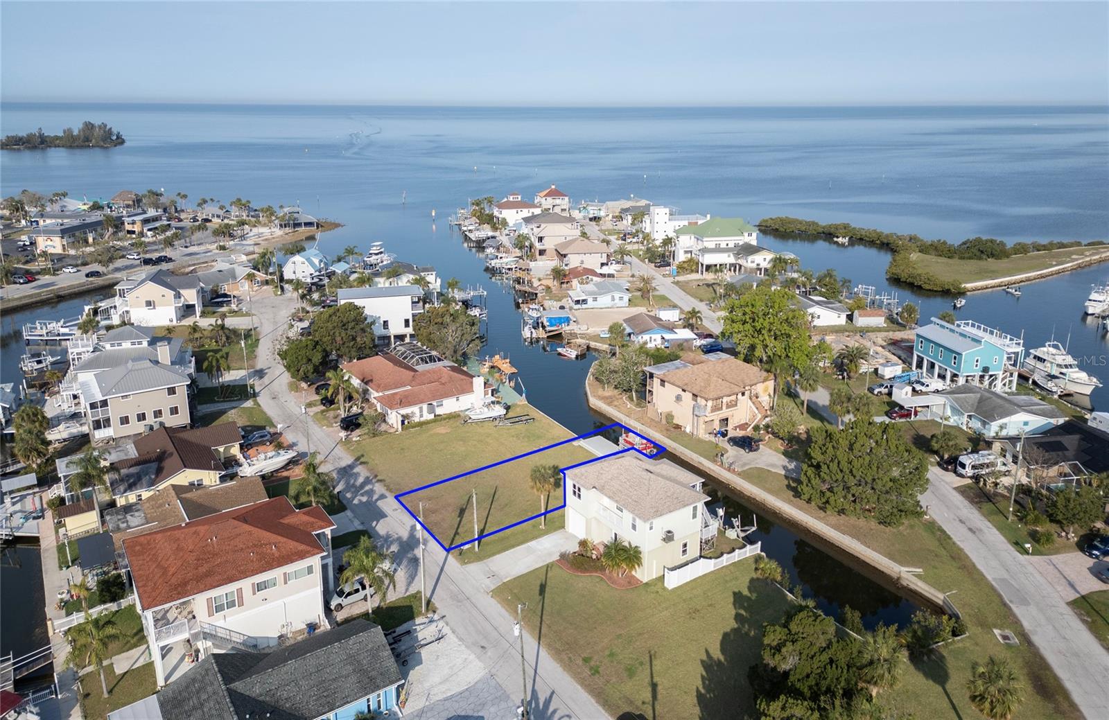This is the lot to have, Why ? 60' of good seawall The lift is in built in 2021 oversize composite dock 2 minute idle to the open Gulf of America , The water electric and sewer are all in place . The geological study has been done and the pilings are not required .So all the major expense of building is done. Oh did I mention the beautiful Gulf views and amazing sunsets , If you want to build this lot is ready to go, Drive by take a look, You will love the upscale neighbor hood the small town feel of Hudson with great restaurant's beaches all just a short golf cart ride away.
Don't miss this one
