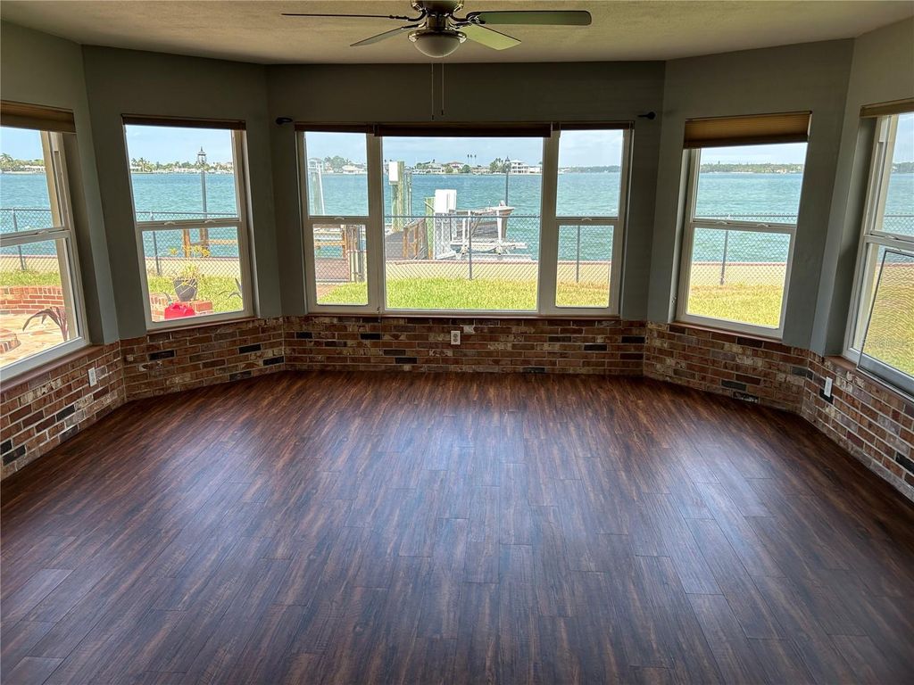 Photo of 21 Paradise Lane, Treasure Island, FL 33706 (MLS # TB8462603)