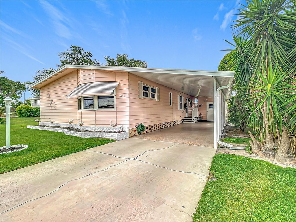 Photo of 6044 Grand Oaks Drive SE, Winter Haven, FL 33884 (MLS # S5126925)