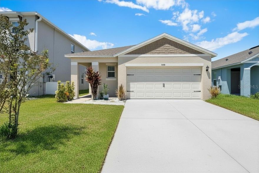 Why wait for new construction when you can move right into this 2023 DR Horton Jemison model offered at just $349,000? With brand-new builds starting at $418,000, this home delivers nearly $70,000 in immediate savings—and it’s already move-in ready with a fully fenced backyard. Located in Courtland Park off Doyle Road in Deltona, on the edge of Osteen, you’ll enjoy quick access to Sanford, Lake Mary, I-4, the 417, and you’re only 30 minutes from the beaches of New Smyrna.  Inside, the open-concept layout feels bright, spacious, and functional with a wide foyer leading into the living and dining areas. The aqua-toned kitchen paired with modern gray cabinetry creates a light, coastal vibe, complemented by soft neutral finishes throughout. The primary suite is privately positioned at the rear of the home and features high ceilings, natural light, a large walk-in closet, double vanities, a walk-in shower, and a private water closet. Two additional bedrooms offer flexibility for family and guests, as well as a home office, gym, or creative space. A large indoor laundry room with natural light and a spacious two-car garage adds everyday convenience.  Step outside to the covered patio and fully fenced backyard—perfect for outdoor dining, pets, and play. With a low HOA of $93 per month, no CDD fees, and energy-efficient construction, this home offers comfort, convenience, and exceptional value. Schedule your private showing today and experience the difference.