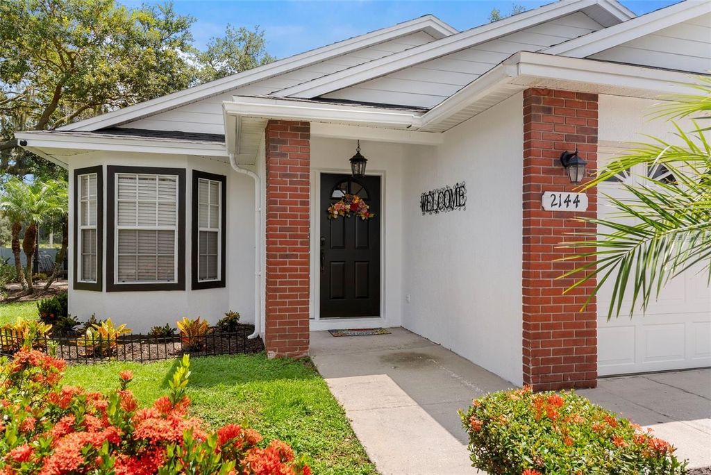 Photo of 2144 Hatteras Point, Lakeland, FL 33813 (MLS # A4689474)