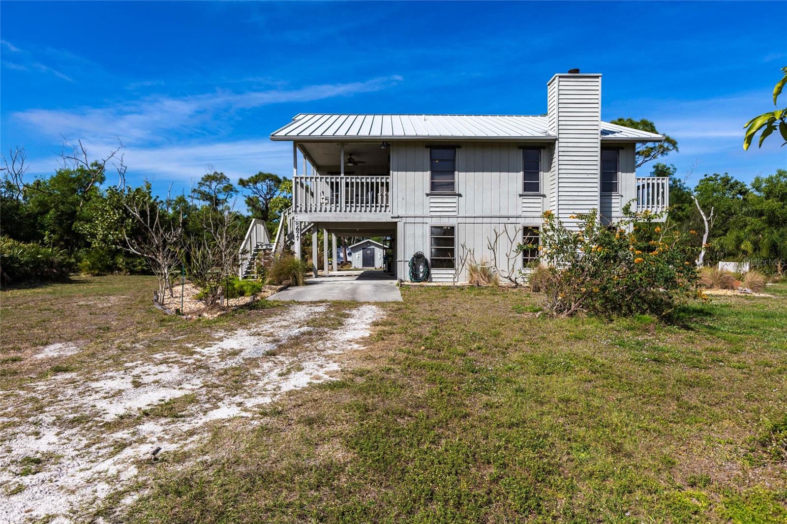 8677 WHISPERING PINES DRIVE